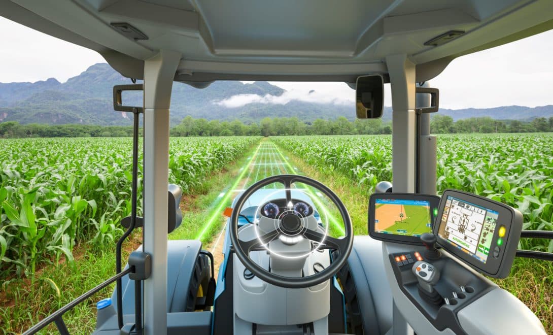 Painel de trator com monitores de piloto automático e de implemento