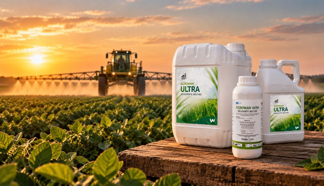 Pulverizador agrícola aplicando defensivos em uma lavoura, com embalagens de adjuvante Agrowan Ultra em primeiro plano